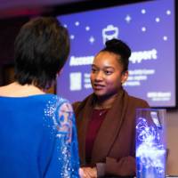 A grad speaks with President Mantella